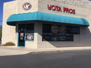 Yota Pros storefront with red letters and a teal awning on S Priest Dr in Tempe